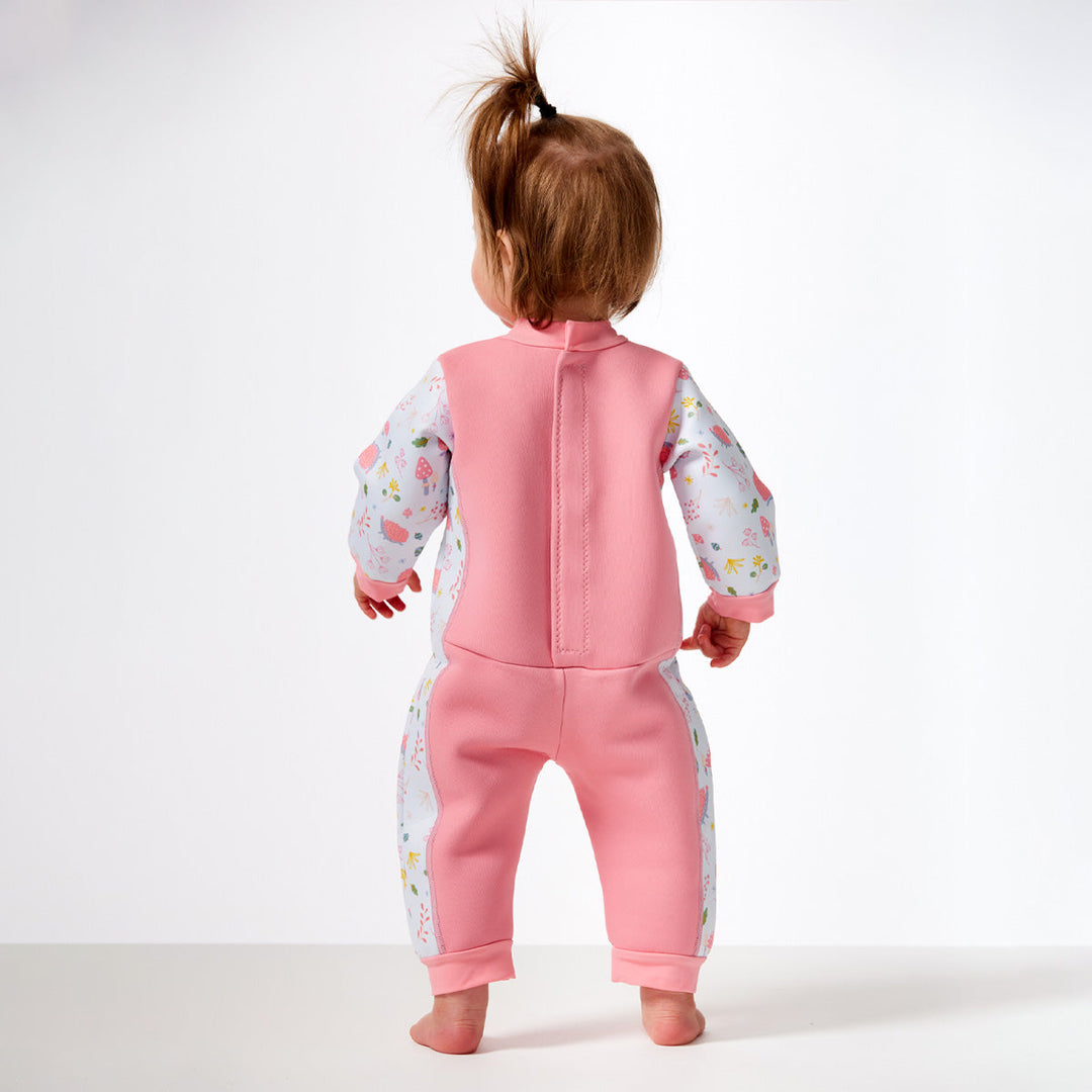 Warm baby wetsuit in forest print with collar and cuffs back